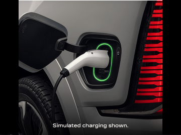 Charger plugged into vehicle with disclaimer “Simulated charging shown.”