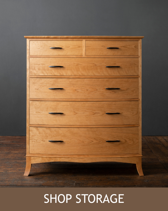 The Crescent Dresser in cherry. Button: Shop Storage