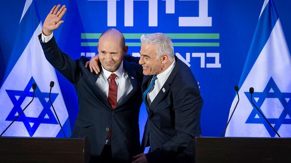 Opposition Leader and Head of the Yesh Atid party Yair Lapid and former Prime Minister Naftali Bennett speak during a press conference announcing a joint party named “Together” 