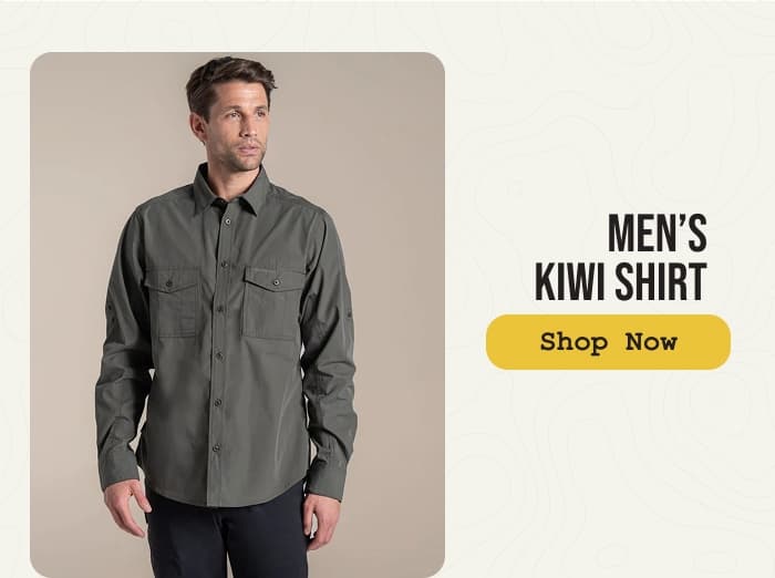 Studio photo of a man wearing a men's kiwi shirt: Shop Now