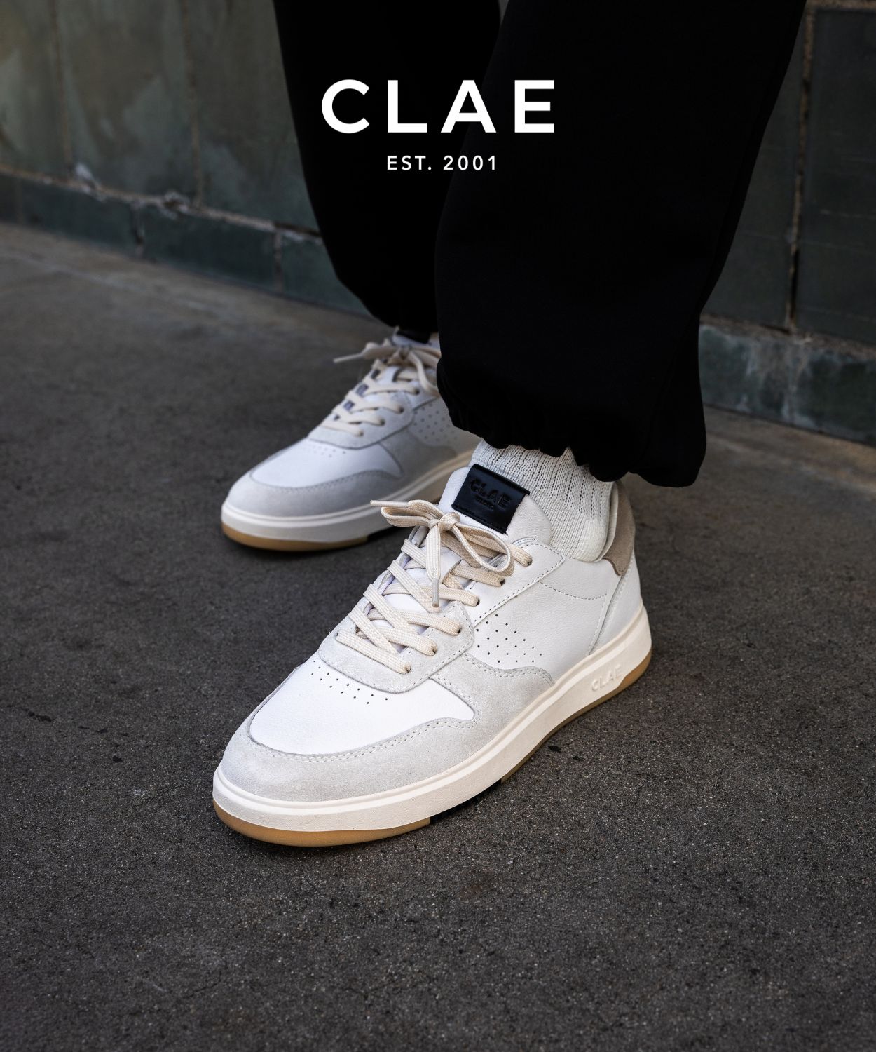 an image of a person wearing white sneakers and socks
