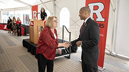 President William F. Tate IV congratulates Deborah Stalling, Business Manager, Susan L. Cullman Laboratory for Cancer Research, on her 50 years of service