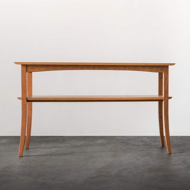 The wing hall table in cherry.