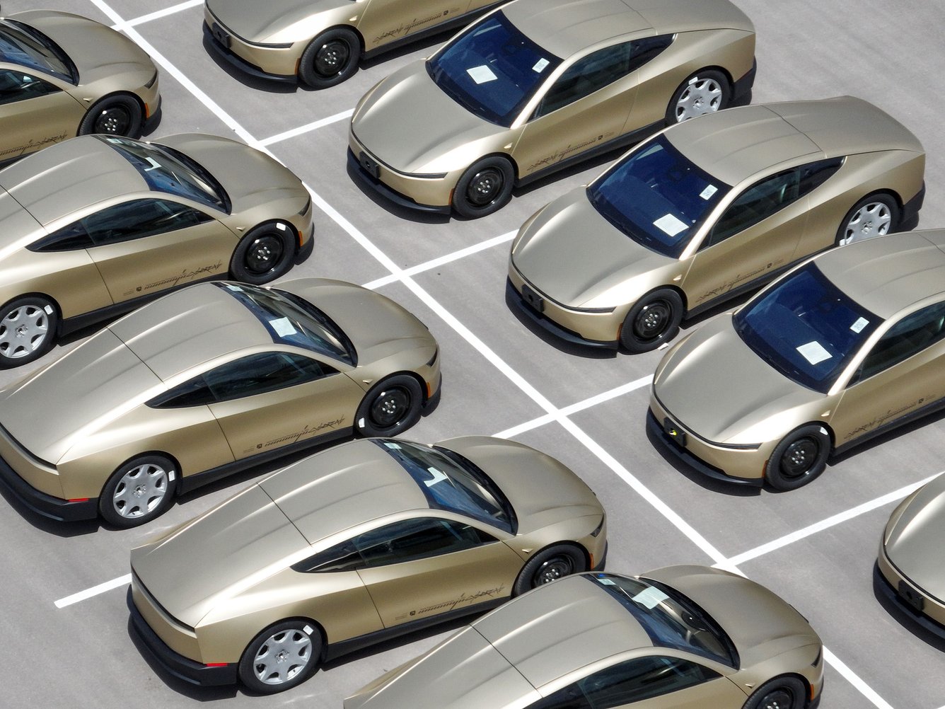 Tesla Cybercabs on a lot at Tesla Giga Texas