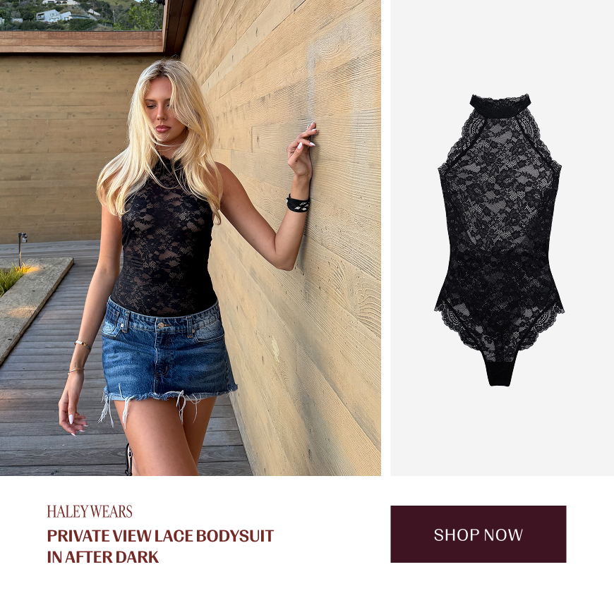 Woman wearing black lace bodysuit and jean skirt