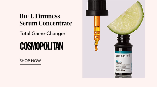 Odacité Bu L Firmness Serum Concentrate bottle with dropper and lime wedge, featuring Cosmopolitan quote “Total Game Changer” and Shop Now.