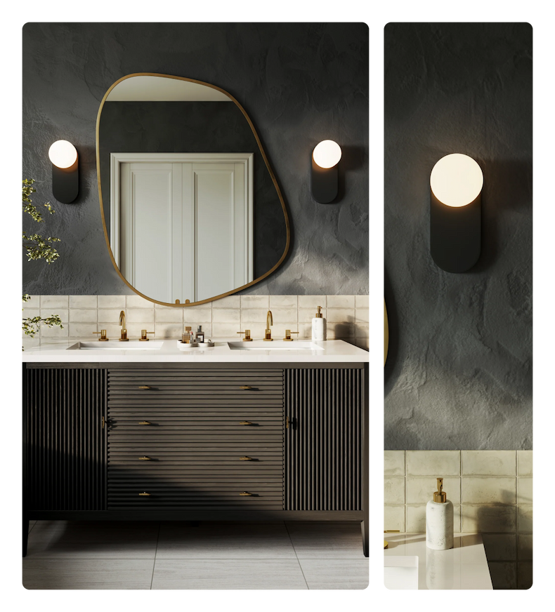 Double vanity with a dark fluted front, arched mirror, and two glowing orb sconces.
