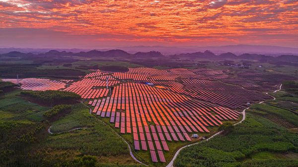  Aerial view of an agrivoltaic farm illuminated by morning glow on October 25, 2025 in Luocheng Mulao Autonomous County, Hechi City, Guangxi Zhuang Autonomous Region of China. 