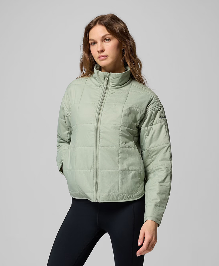 Woman in a green jacket