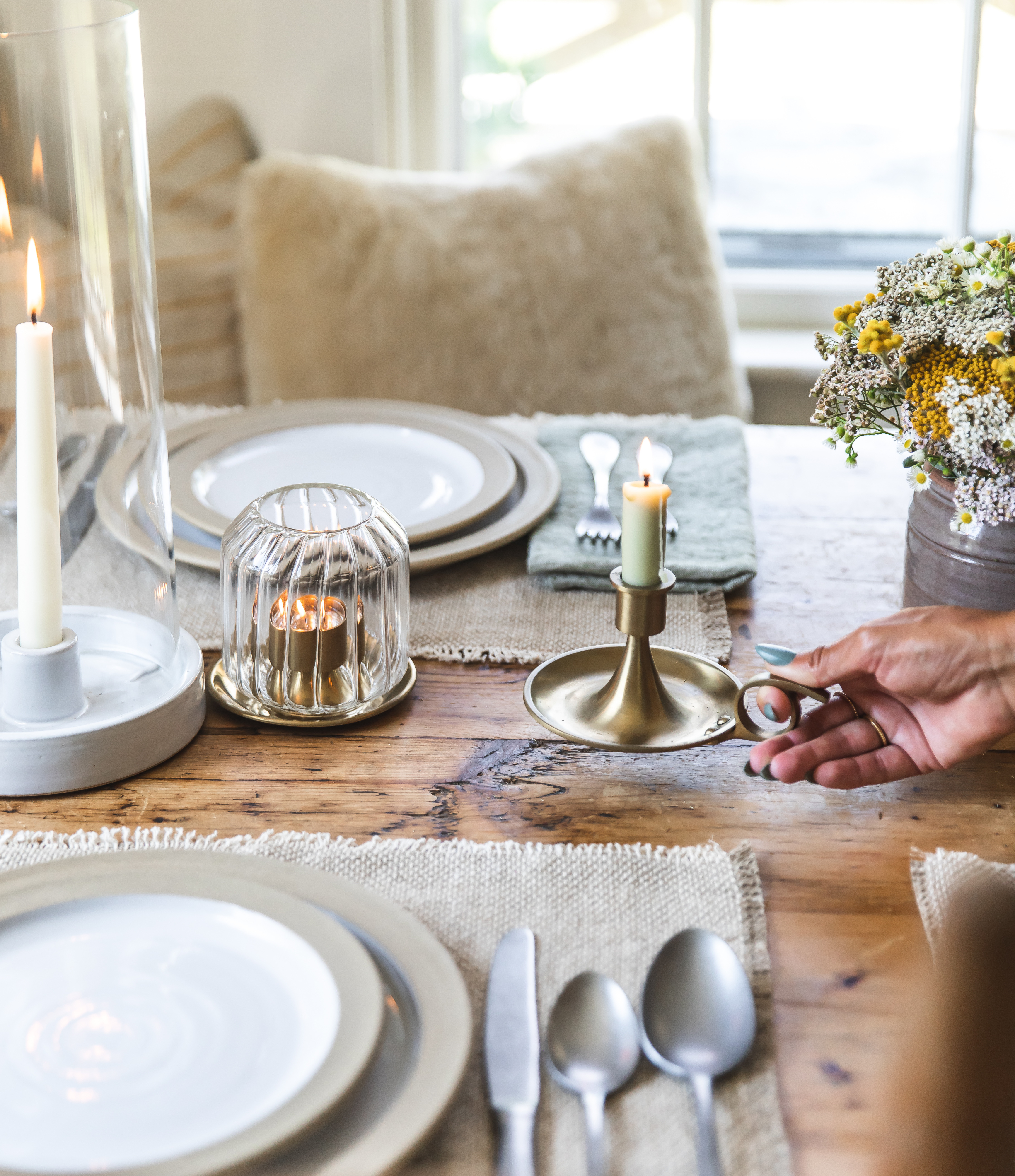 A summer table set with candlelight