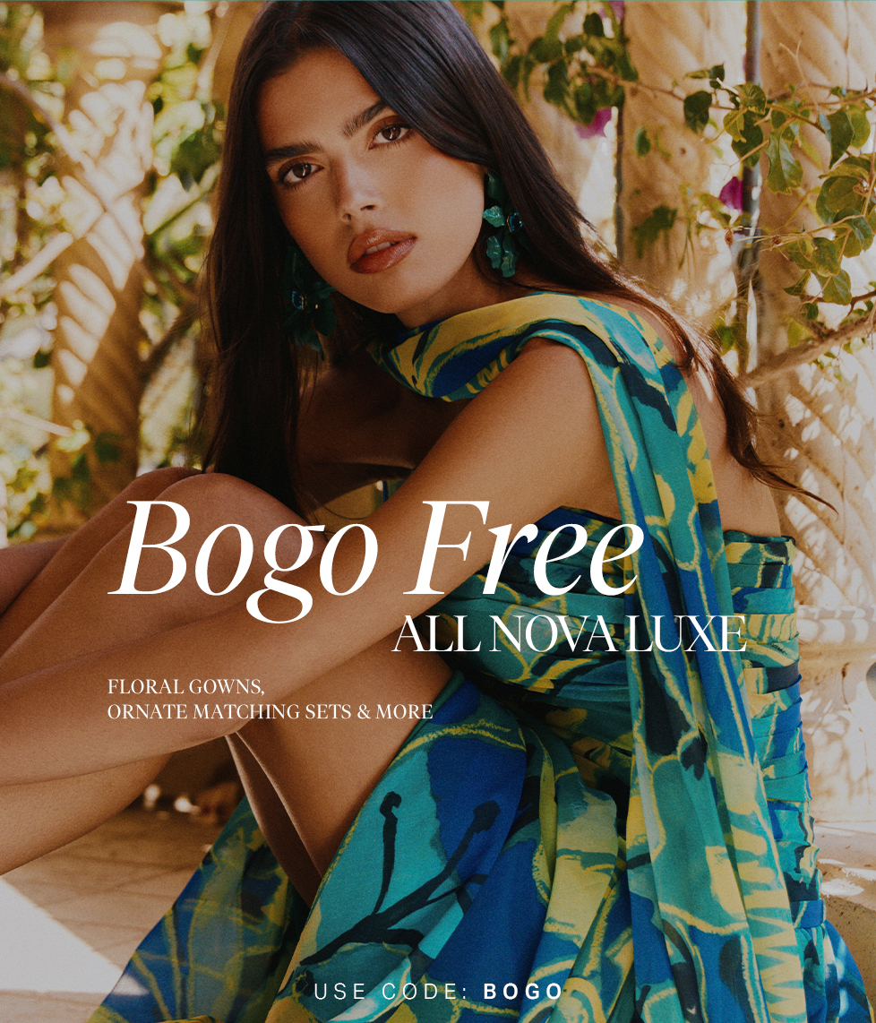Woman in teal, blue, yellow floral gown, promoting BOGO Free Nova Luxe sale on floral gowns & ornate matching sets. Code: BOGO.