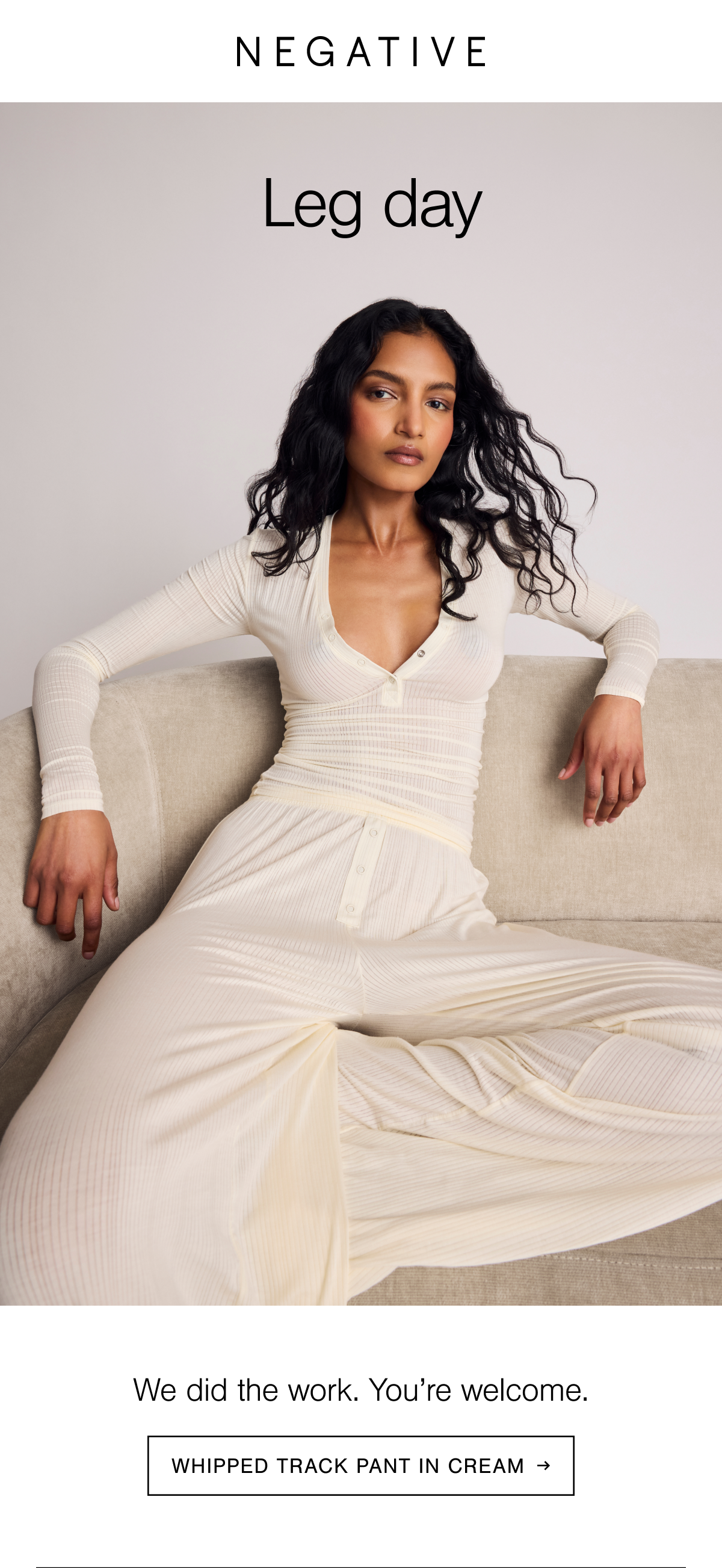 Model is wearing the Whipped Henley and Track Pant in Cream. Shop new Whipped in Cream.