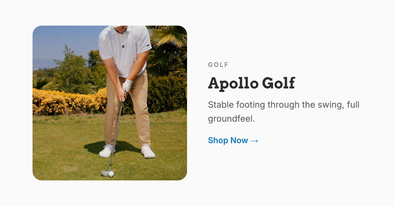 Golfer mid-swing on a course, wearing Peluva Apollo Golf shoes