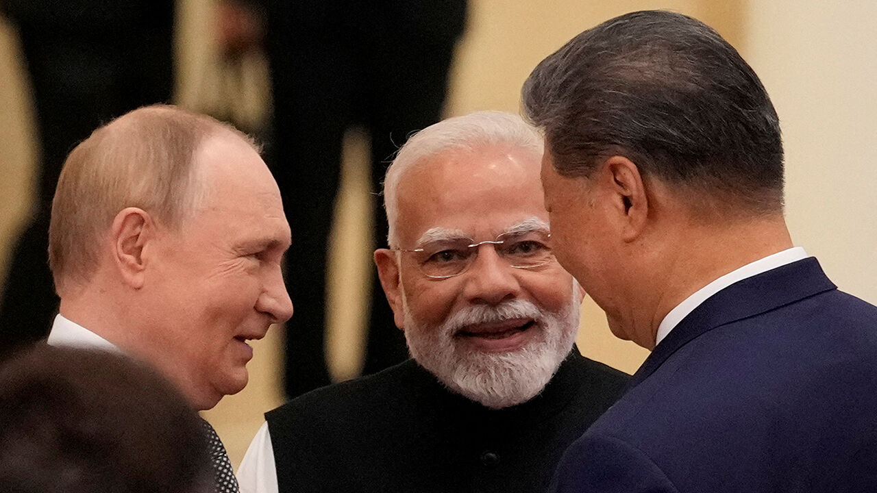 Indian Prime Minister Narendra Modi talks with Russian President Vladimir Putin and Chinese President Xi Jinping ahead of the Shanghai Cooperation Organization (SCO) Summit 2025 in Tianjin