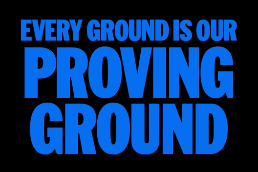Text reads "EVERY GROUND IS OUR PROVING GROUND&rdquo;