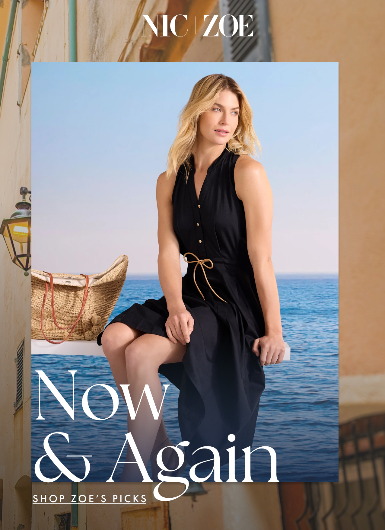 A woman in a Sienna Dress sitting on a dock with a bag and the ocean in the background. Above her, text reads "NIC+ZOE" and below her, larger text says "Now & Again" with smaller text that reads "SHOP ZOE’S PICKS".