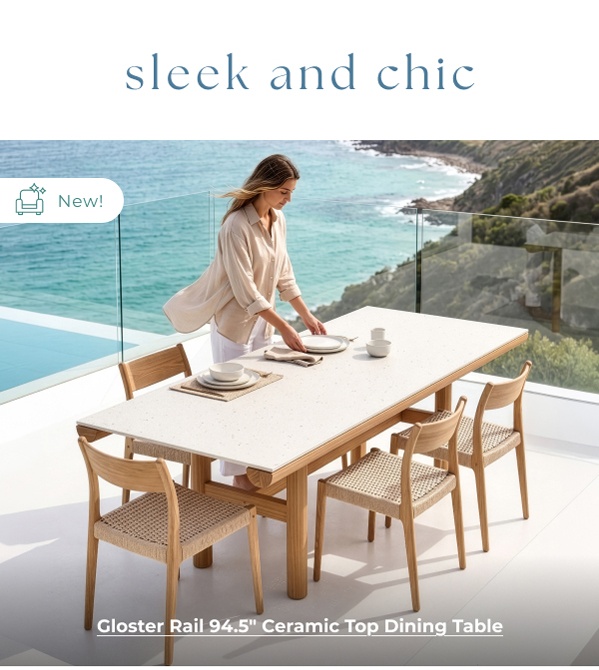 Woman setting outdoor ceramic dining table. Image Text: sleek and chic New! Gloster Rail 94.5in Ceramic Top Dining Table