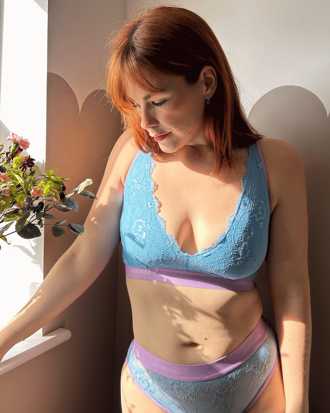 MODEL IN PASTEL BLUE BRA 