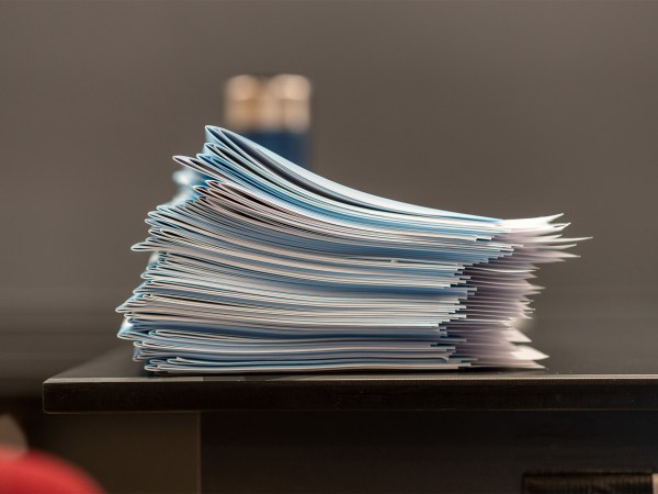 Stack of blue books.