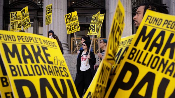 People protest in New York City calling for billionaires to pay more tax.