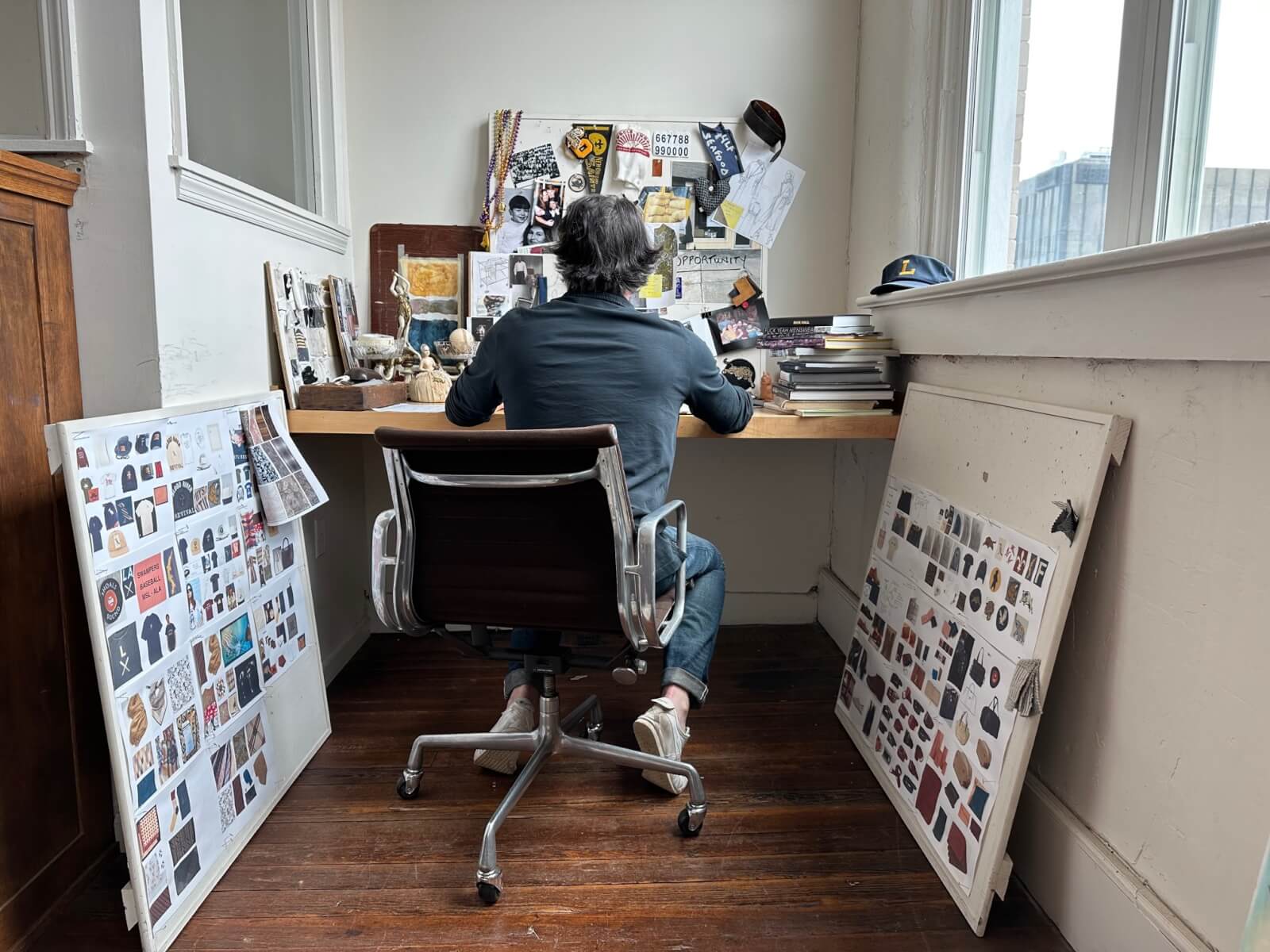 Billy works at his desk