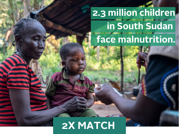 A young child in South Sudan is checked for malnutrition by a community health worker in South Sudan