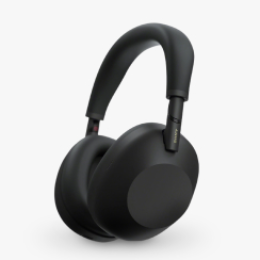 A pair of black Sony headphones on a light gray tile.