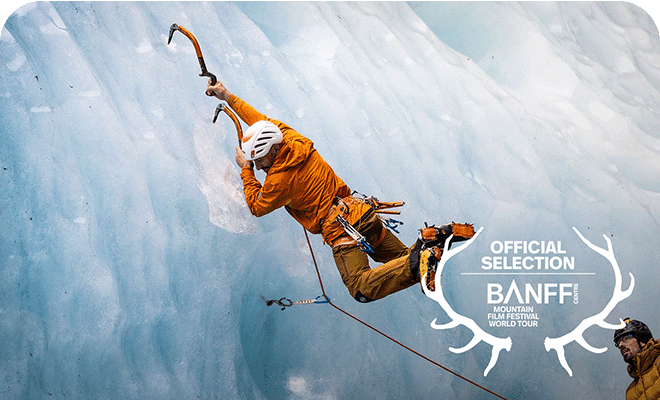 Jeff Mercier swinging off ice axes on a technical ice climbing route