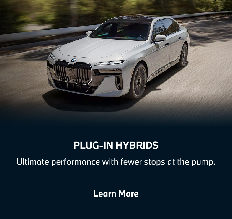 BMW i7 driving down the road. Learn more.