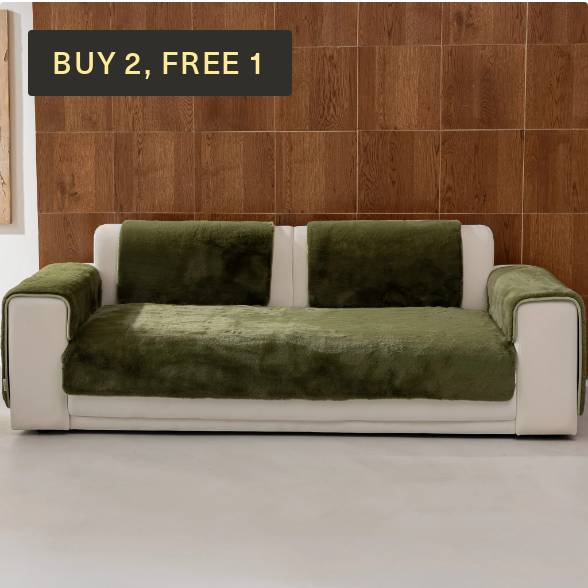 Magic Sofa Mat - Mink in dark green on a sofa with Buy 2, Free 1 offer.
