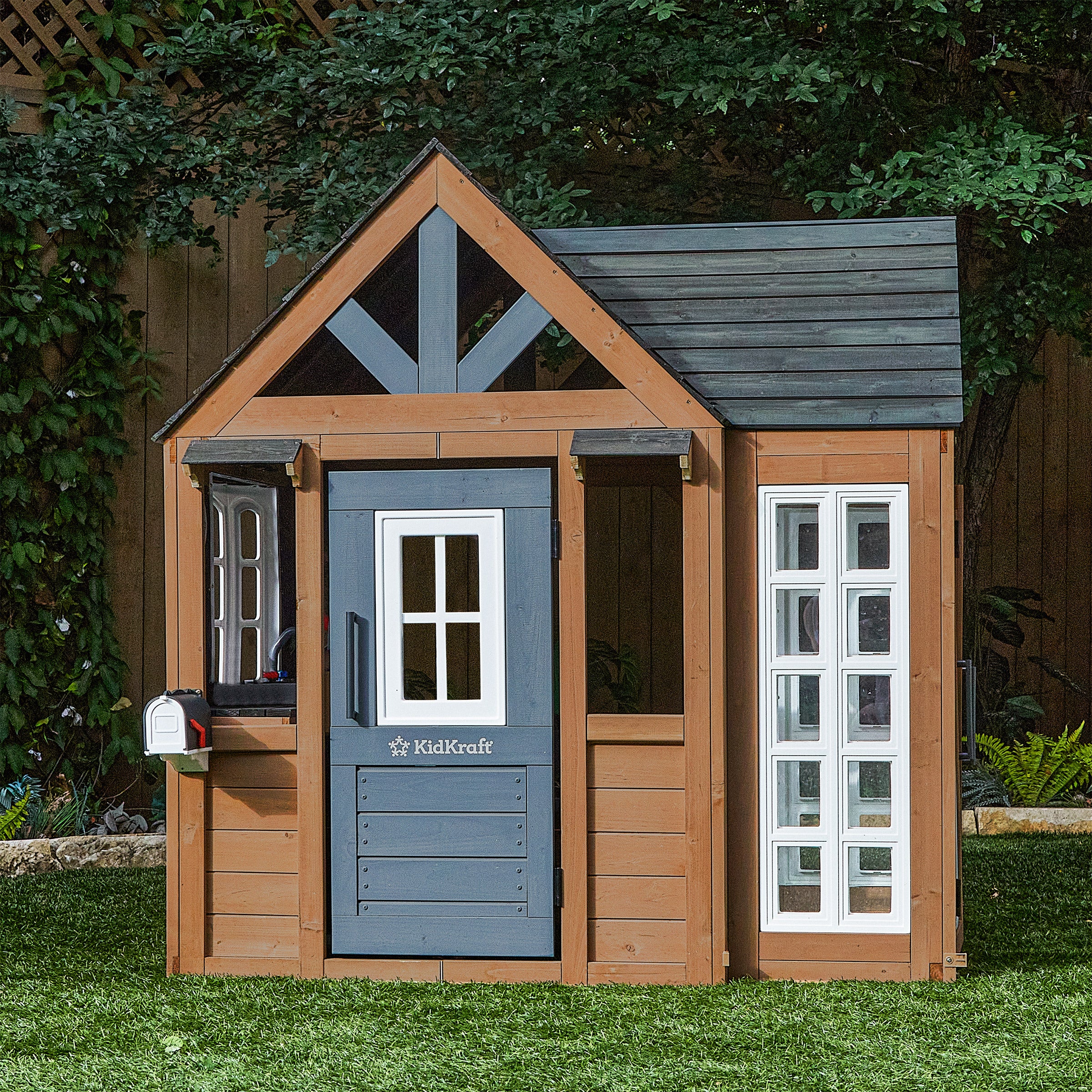 KidKraft Atrium Breeze Wooden Outdoor Playhouse with Sunroom and Play Kitchen