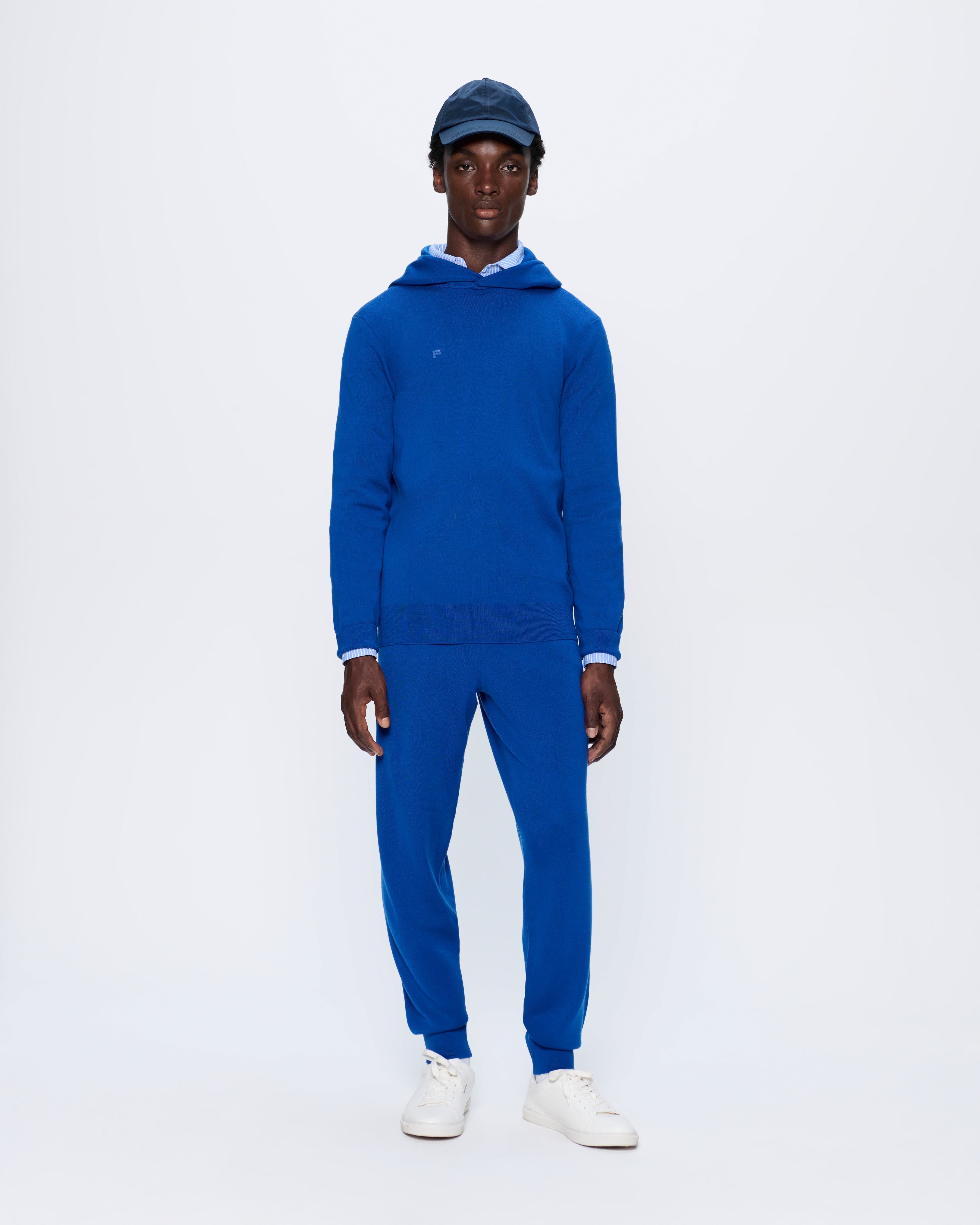 Image of Mens Regenerative Merino Wool Track Pants—earth blue