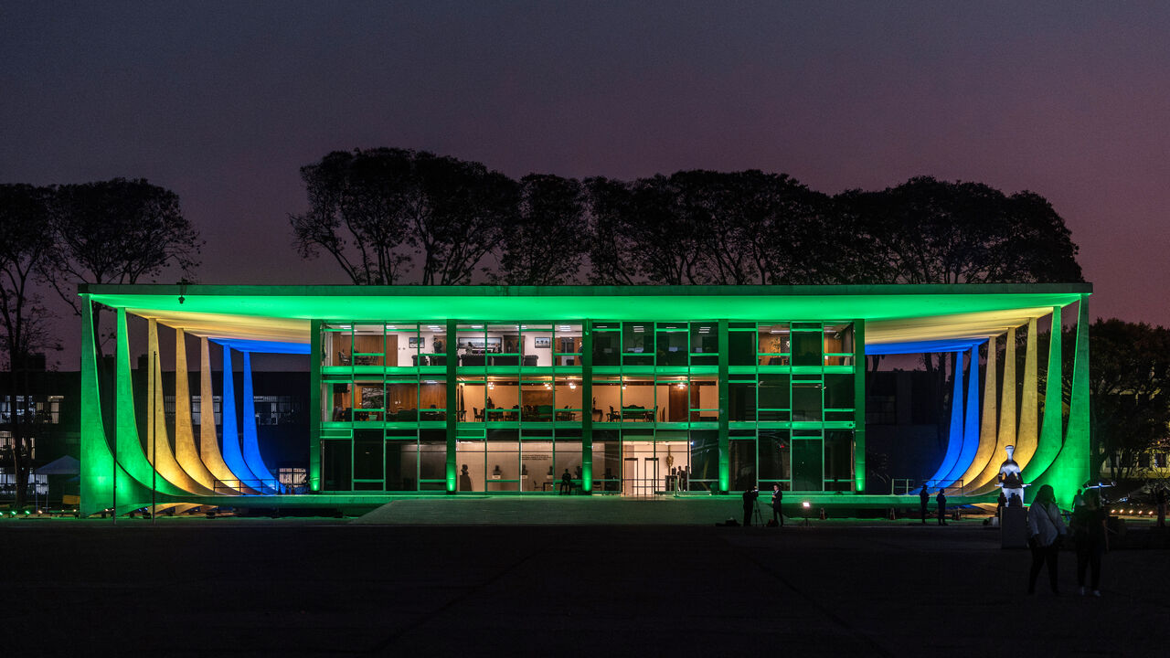 The Brazilian Supreme Court building in Brasilia, lit up in the national colors 