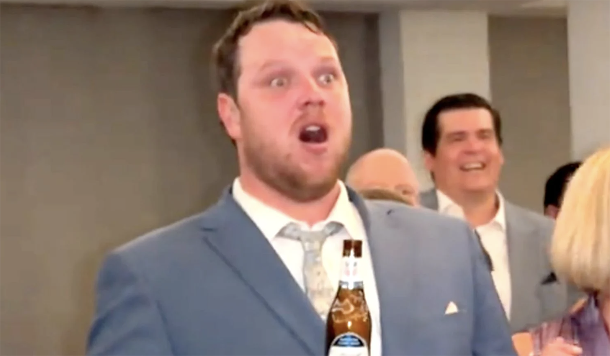 A man with a surprised look on his face.