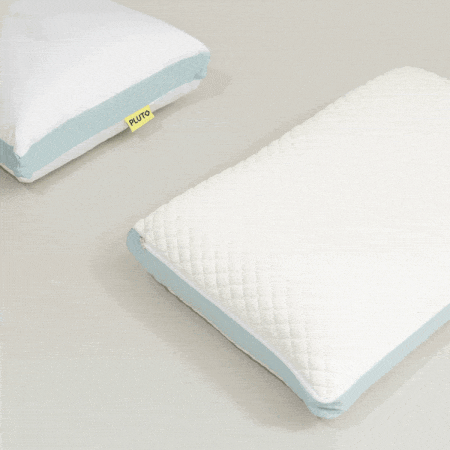 two pillows on a table