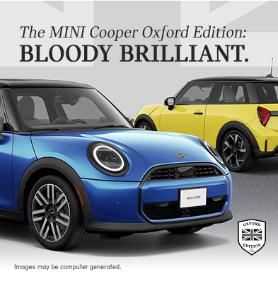 Two MINI Cooper Oxford Editions are shown parked, side by side.