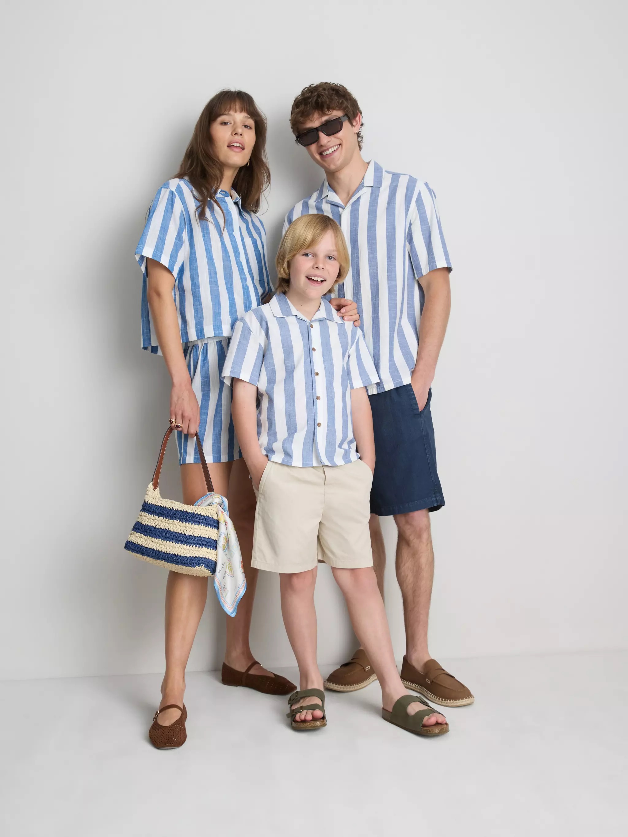 Woman, man and a boy wearing a Relaxed Stripe Beach Shirt