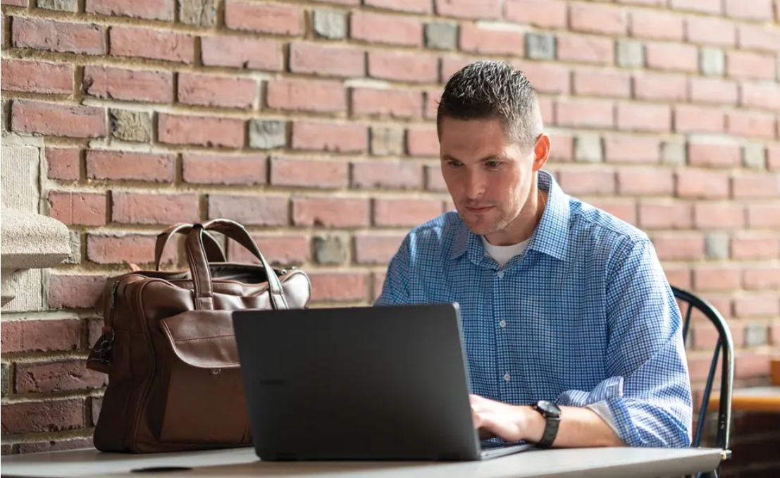person using laptop