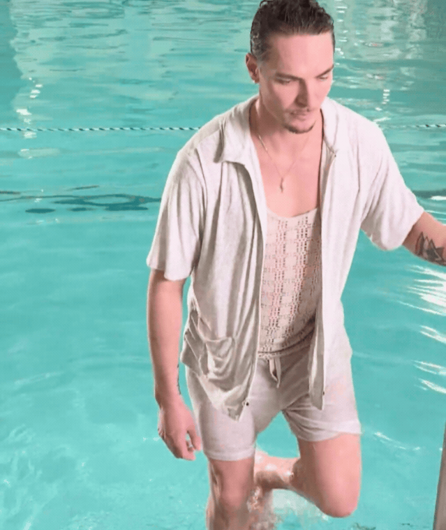 Man walking out of pool