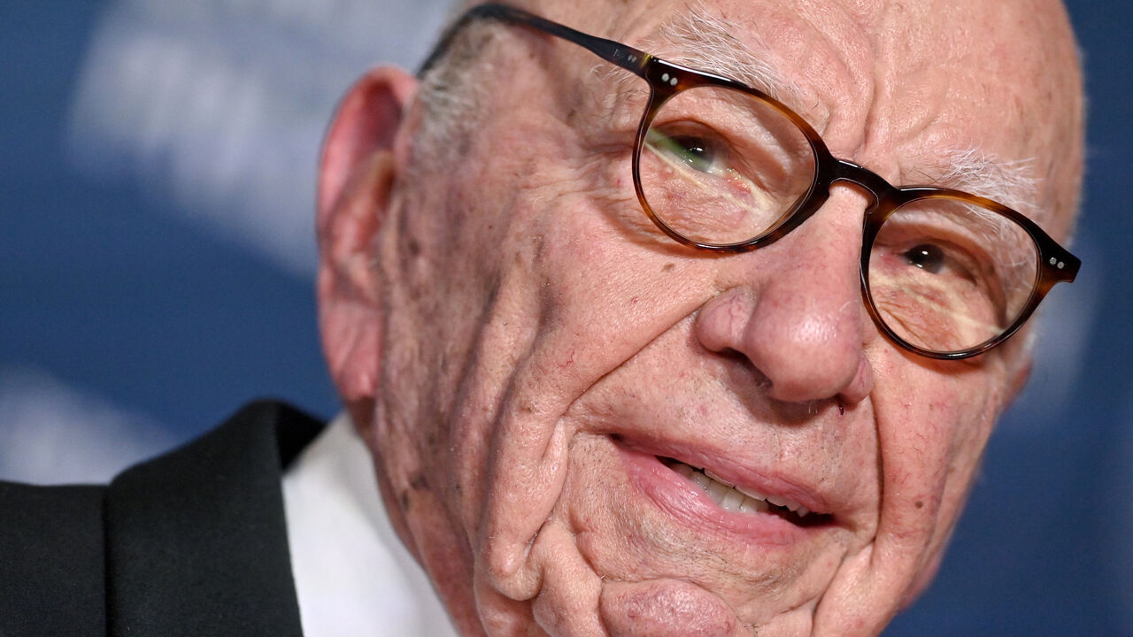 Rupert Murdoch smiling.