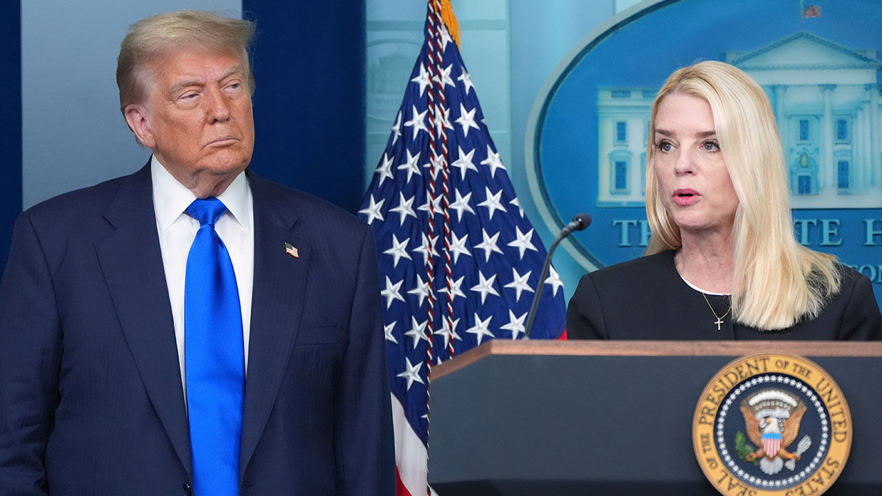 Attorney General Pam Bondi speaks to reporters as President Donald Trump listens, June 27, 2025, in the briefing room of the White House in Washington. 