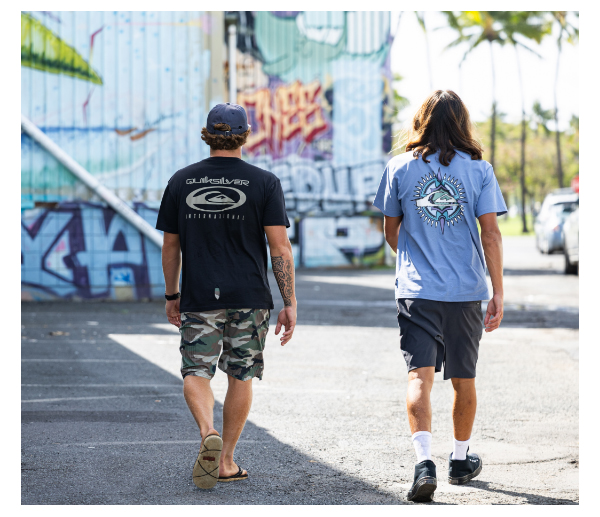 Quiksilver graphic tees styled with boardshorts for summer beach days