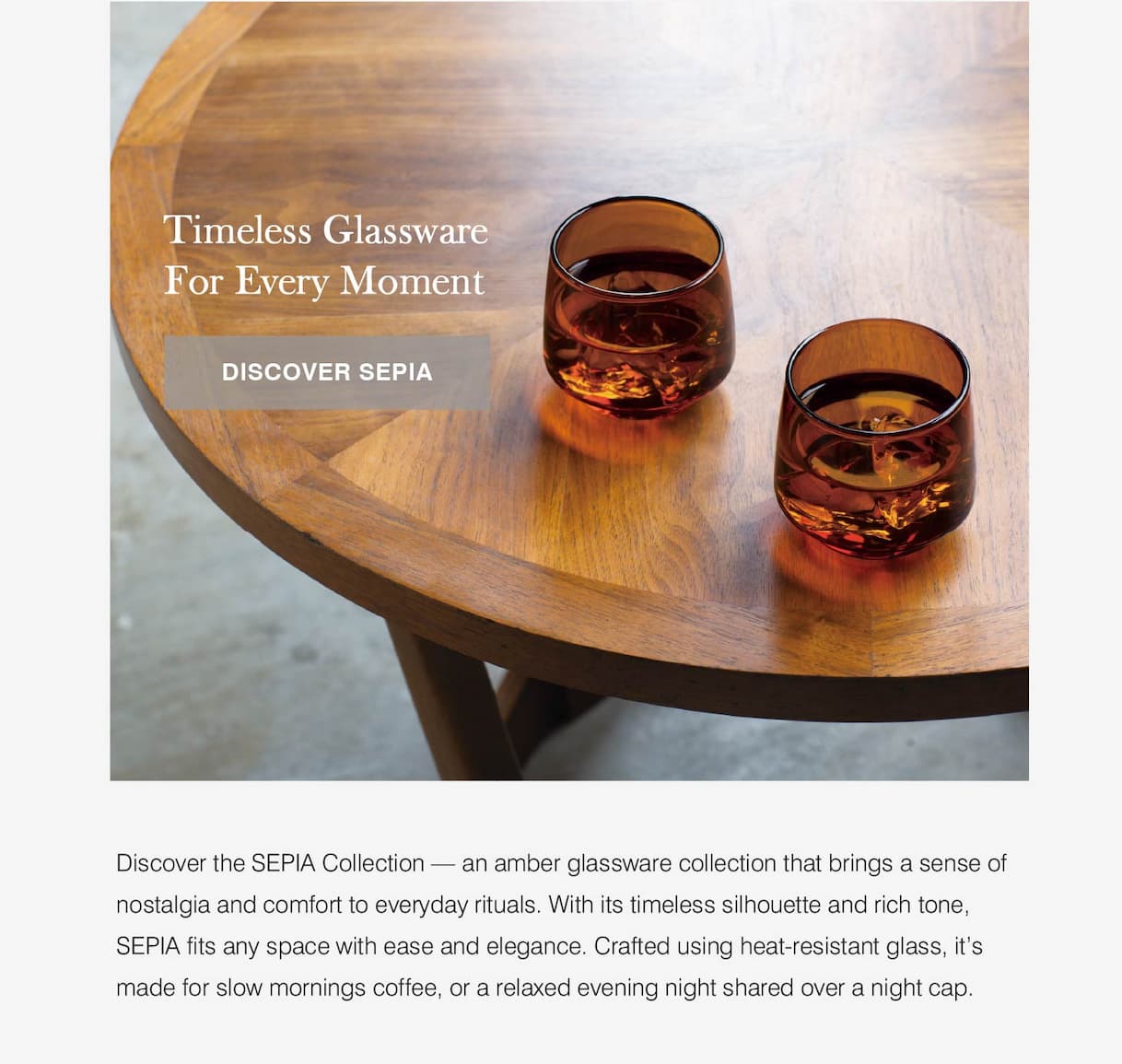 an image of a table with two glasses of wine on it