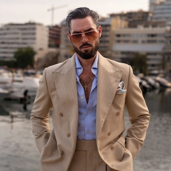 Striped tie with a white pocket square
