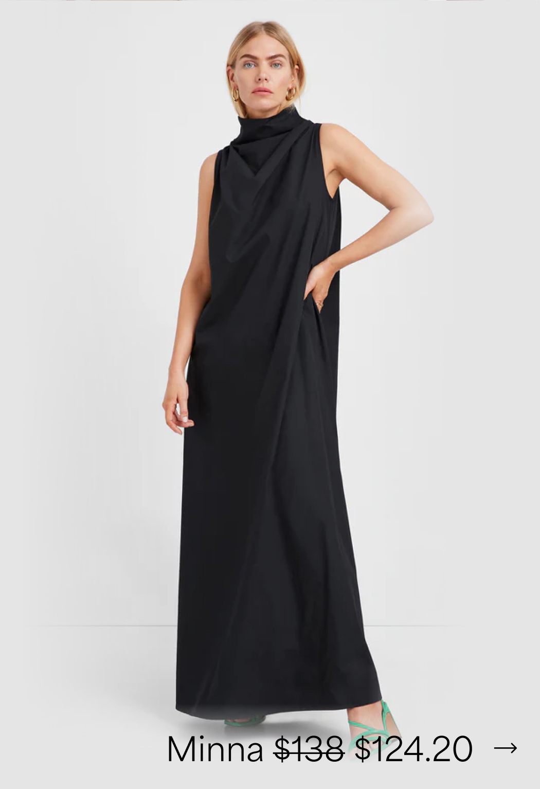 Maritza in The Minna Sleeveless Dress featuring a draped cowl neckline and side pockets.