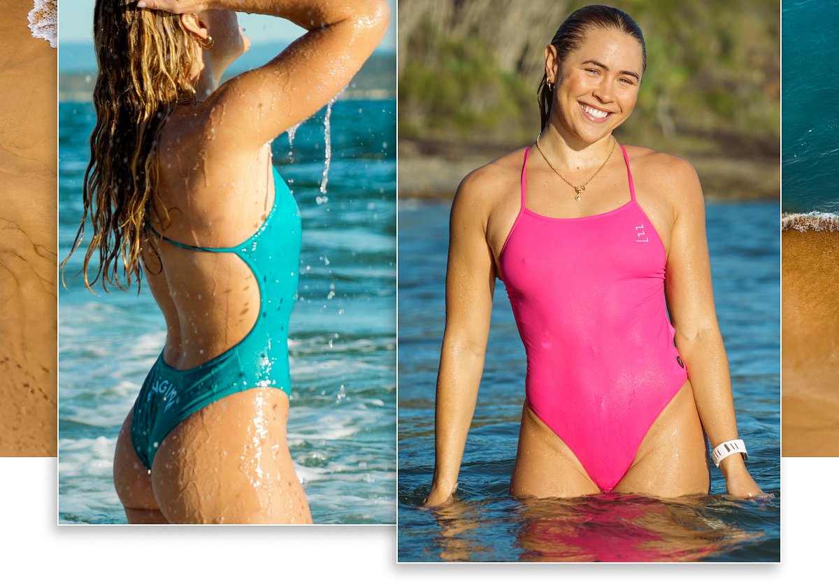 Two women in swimsuits standing in water, one in a teal swimsuit and the other in a pink swimsuit.