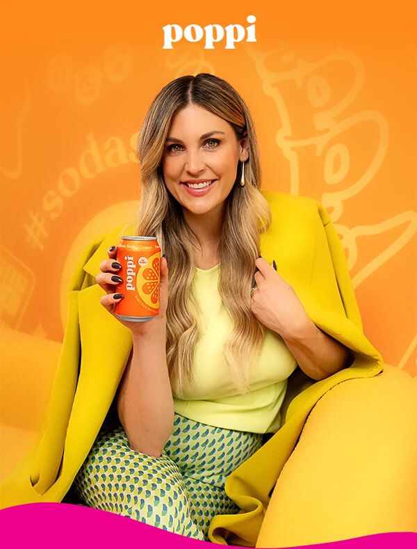 image of Allison holding orange poppi