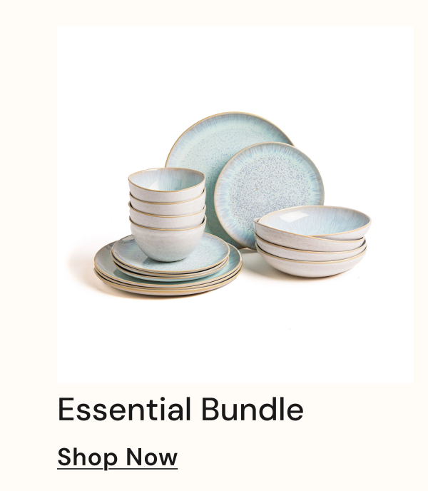 Stacked plates and bowls with a cup in a soft blue and white color scheme.