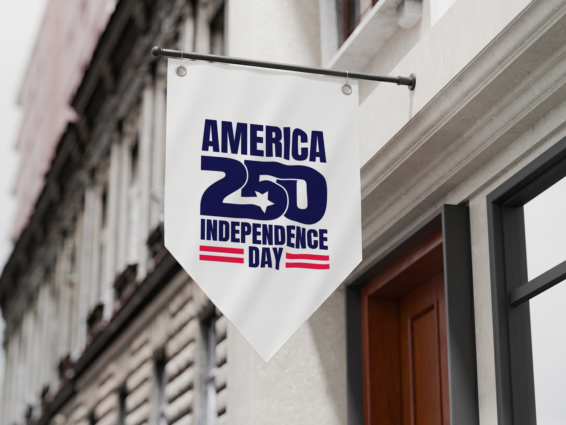 White custom pennant banner mounted on a black wall bracket outside a building, featuring a bold “America 250 Independence Day” design in navy blue and red. The patriotic banner commemorates the United States’ 250th anniversary and is displayed as festive décor for civic celebrations, community events, and storefront promotions.