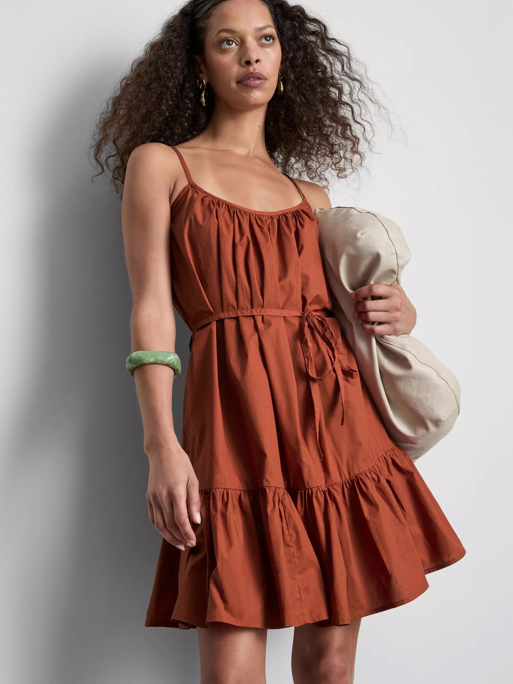 Woman wearing a Strappy Ruffle Poplin Mini Dress